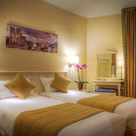 Hotel Louvre Sainte Anne Παρίσι Δωμάτιο φωτογραφία